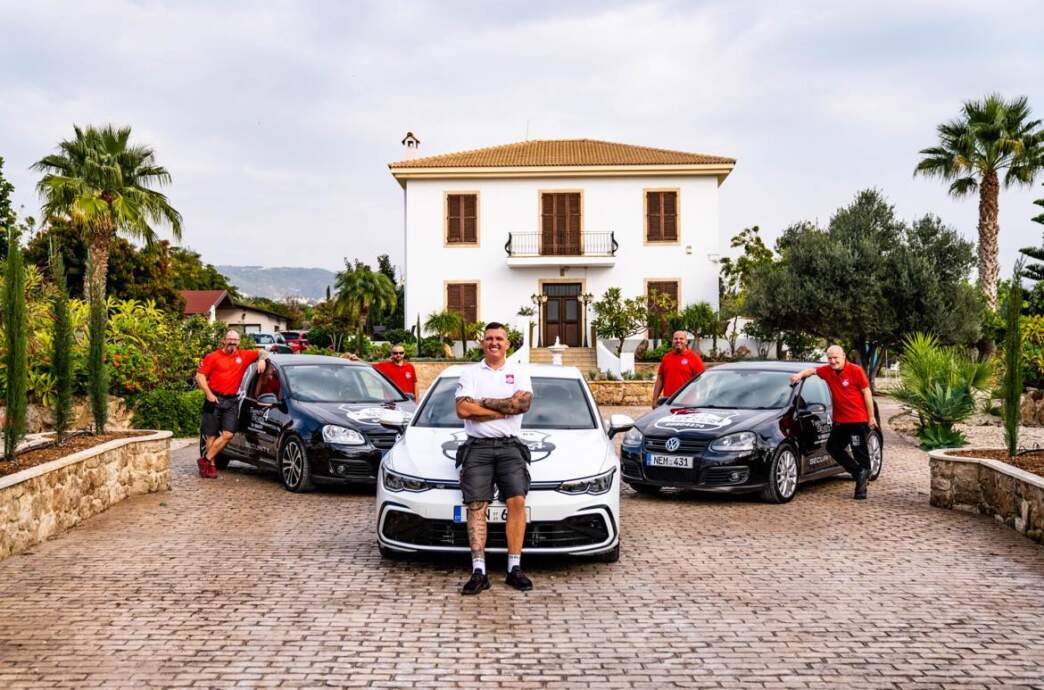 The Twenty4Seven response team with three branded vehicles on the driveway of a Paphos villa